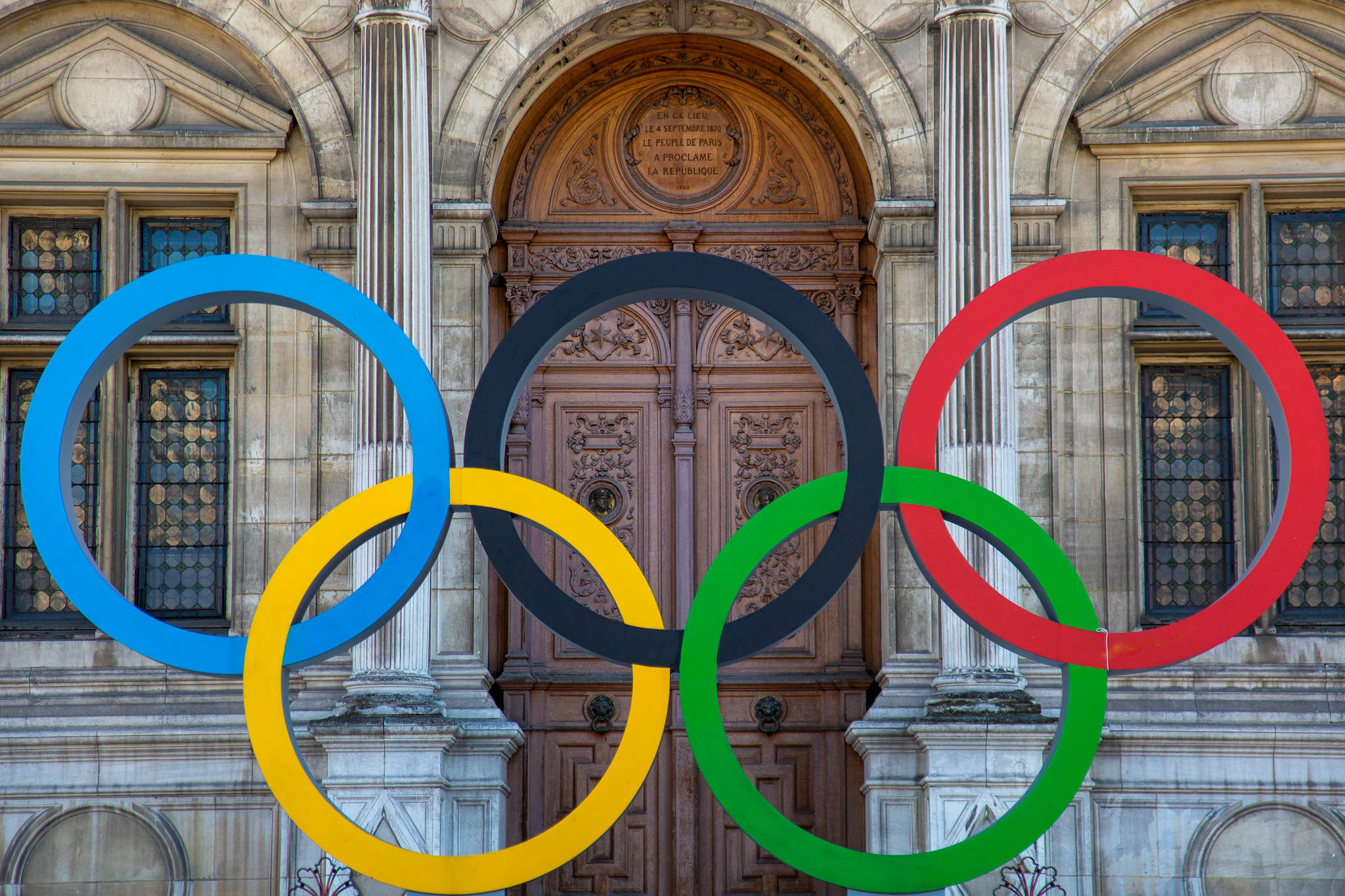 Paris 2024 Girl practicing sports in front of the Paris Town Hall