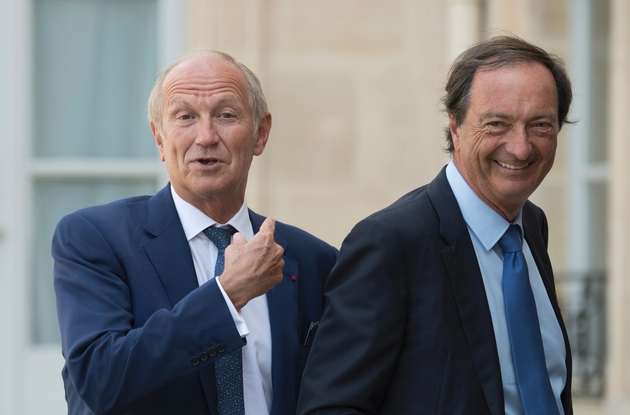 Le PDG de L'Oréal Jean-Paul Agon (à gauche) aux côtés du PDG de E. Leclerc Michel-Edouard Leclerc arrivent à l'Elysée, le 17 juillet 2018