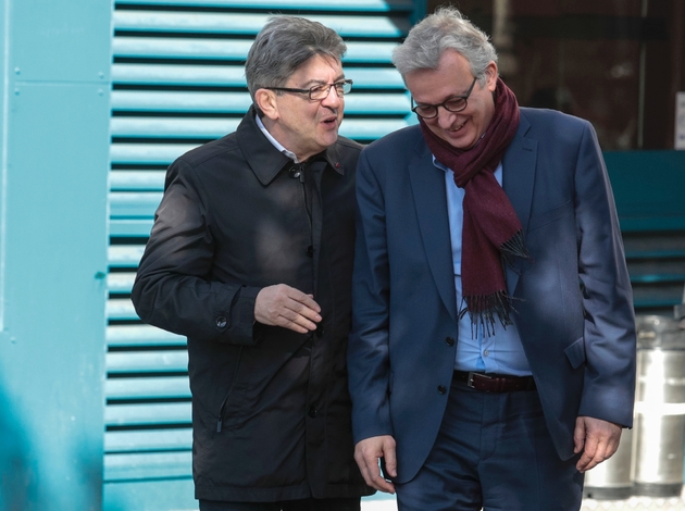 Jean-Luc Melenchon (g) et le premier secrétaire du Parti communiste français, Pierre Laurent, le 24 février 2017 à Paris