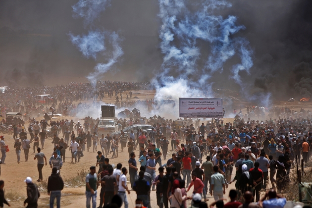 Des Palestiniens manifestent à Gaza contre l'inauguration de l'ambassade américaine à Jérusalem, le 14 mai 2018