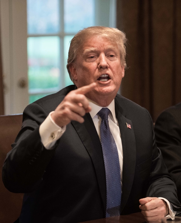 Le président américain Donald Trump lors d'une réunion avec ses principaux conseillers militaires à la Maison blanche à Washington le 9 avril 2018
