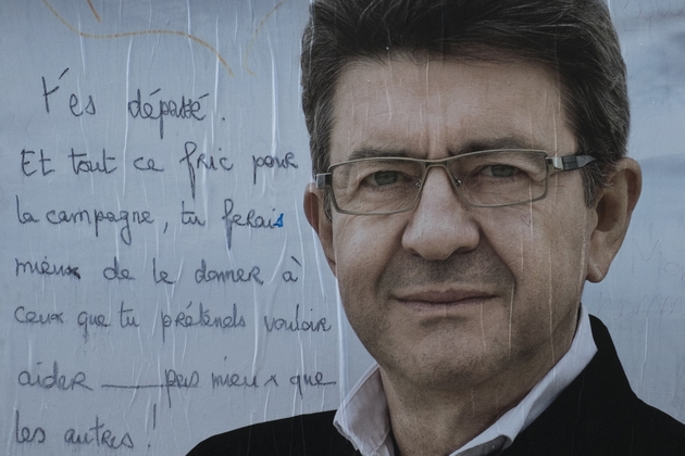Graffiti sur une affiche de campagne de Jean-Luc Mélenchon  le 19 avril 2017