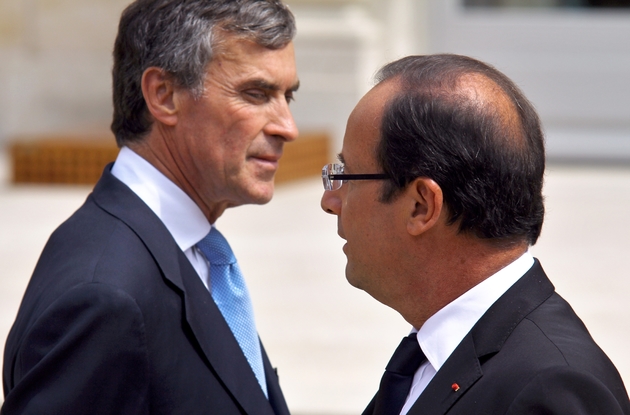Jérôme Cahuzac et François Hollande dans la cour de l'Elysée le 4 juillet 2012 à Paris