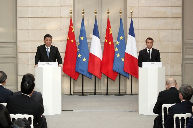 Emmanuel Macron (d) et son homologue chinois Xi Jinping , lors d'une conférence de presse à l'Elysée, le 25 mars 2019