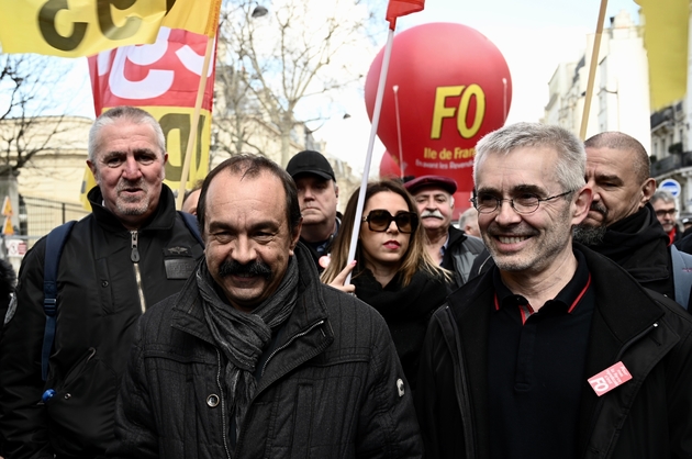 Philippe Martinez et Yves Veyrier lors d'une manifestation contre la réforme des retraites le 19 mars 2019 à Paris