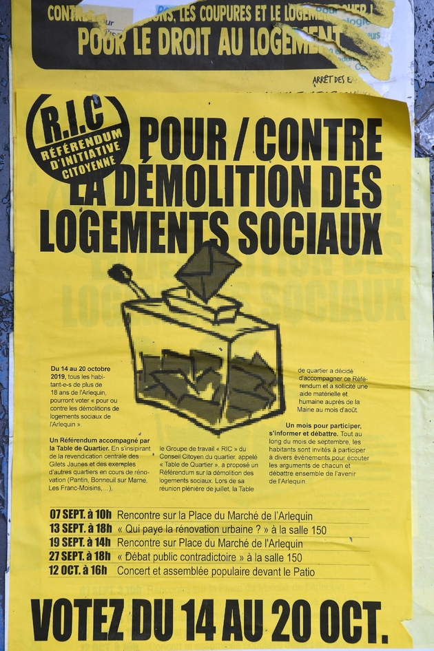 Une affiche sur le Référendum d'initiative citoyenne (RIC) organisé du 14 au 20 octobre 2019 dans un quartier de Grenoble pour tenter d'empêcher la démolition partielle de la galerie de l'Arlequin