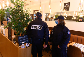 Paris: Health pass control by the police in a restaurant